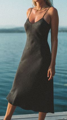 100% silk. The iconic 90s silk slip dress.The dress for any occasion, taking you from day to night - always looking like a 90s supermodel. Made from 100% of the finest sand-washed silk with a matte sheen giving it a soft and subtle elegance. Cut on the bias for a flattering drape over the body. Adjustable straps Lined over the bust for extra coverage Bra-friendly A timeless silk slip that will last forever, until one day you'll pass it onto your daughter. 90s Slip Dress, Iconic 90s, Coverage Bras, Dresses Xxl, Silk Slip Dress, Day To Night, Silk Slip, Models Off Duty, To Night