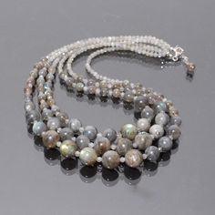 "PRODUCT DETAIL : ITEM : LABRADORITE BEADED NECKLACE ITEM CODE : DGC3040 ITEM NAME :NECKLACE GEMSTONE : LABRADORITE BEADS SHAPE : ROUND LENGTH : 19\"-22\"+ 2\" inch Chain APPROX BEADS SIZE: 3.5mm/6.5-12mm Approx WEIGHT : 410 Cts. APPROX CUSTOMIZATION/BULK ORDER : AVAILABLE PLEASE FEEL FREE TO CONTACT IF YOU REQUIRE ANY FURTHER INFORMATION." Adjustable Labradorite Necklaces With Round Beads, Labradorite Beaded Round Necklaces, Labradorite Round Beads Necklace, Labradorite Beaded Necklaces For Jewelry Making, Elegant Beaded Necklaces With Round Labradorite Beads, Elegant Labradorite Beaded Necklaces With Round Beads, Opal Jewelry Necklace, Round Bead Necklace, Rainbow Moonstone Necklace