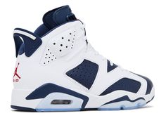 The Air Jordan 6 Retro "Olympic" is a classic sneaker that originally debuted in 2000. The design draws inspiration from the 1992 Olympics and celebrates Michael Jordan’s performance as part of the Dream Team. It features a striking colorway with a white leather upper contrasted by deep navy blue overlays. Hits of red accent the tongue, heel tab, and midsole, evoking the colors of Team USA. The silhouette is completed with a visible Air unit in the heel, a lace lock for secure fit, and the iconi Jordans Retro, Jordan 4’s, Jordan Yeezy, Jordan Retro 6, The Dream Team, Retro 6, Air Jordan 6 Retro, Jordan 6 Retro, Jordan 9