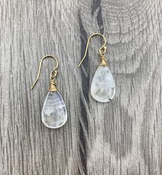 "Looking for the perfect pair of earrings? Something you can put on and wear from daytime to evening? Well...look no further...here they are! Soft hues to soften your style...these earrings showcases these stunningly beautiful Moonstone gemstone teardrops and compliments most any outfit in your closet! These earrings will be your new to-go pair that will make you ready to tackle the demands of your everyday life. It brings enough gravity to be notice but not so much that it creates a drag or tak Faceted Moonstone Teardrop Earrings, Teardrop Moonstone Faceted Earrings, White Rainbow, June Birth Stone, Earrings Photo, Gravity, Perfect Pair, Everyday Life, Statement Earrings