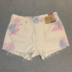 Nwt. Levi’s White Denim Shorts With Tie Dye Detail. Size 33. High Rise. Fitted Through Hip. 100% Cotton. White Relaxed Fit Jean Shorts For Summer, Levi's Cotton Jean Shorts For Summer, Levi's Cotton Jean Shorts For Spring, Levi's White Casual Shorts, White High Waist Relaxed Fit Jean Shorts, Casual White Levi's Shorts, White Levi's Bottoms For Summer, White Levi's Shorts For Summer, Levi's White Cotton Shorts