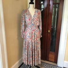 Boho Tiered Maxi Dress, 48” Long From Center Of Neck At The Back To Hem. This Will Fit A Size 4-6 Or 6/8 Depends On Your Body Type. Bust Is 18.5”. Is Non Stretch. I Am 5”1 And Nearly Hits The Floor. It Is A Gorgeous Flower Pattern, Very Summery. It Is Sheer But Is Fully Lined. Elastic Waist. This Dress Is Elegant And Casual. Is A True Medium. Im A Size 2/4 Petite And It Is Too Big For Me. I Think Pictures Don’t Do Justice To Its Beauty! Bohemian Fitted Midi Dress With Ditsy Floral Print, Boho Print Long Sleeve Dress For Daywear, Flowy Bohemian Midi Dress Lined, Bohemian Fitted Floral Dress For Daywear, Long Sleeve Bohemian Floral Dress For Daywear, Bohemian V-neck Floral Dress For Daywear, Fitted Bohemian Floral Dress For Daywear, Long Sleeve Ditsy Floral Maxi Dress For Garden Party, Pink Bohemian Floral Dress For Daywear