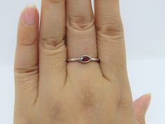 Vintage Sterling Silver Marquis cut Garnet Ring...Marked 925...Total of weights 1.4grams... Size 7...Measure of Face 3.8MM...It's in very good condition. Formal Stackable Ruby Ring In Sterling Silver, Filigree Ring, Garnet Rings, White Opal, Favorite Rings, Solitaire Ring, Vintage Sterling Silver, Amazing Jewelry, Garnet