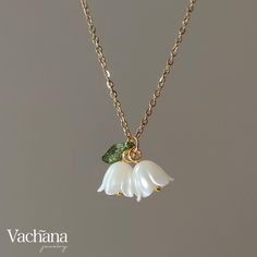 ~ Welcome to Vachana Jewellery ~ ✧ See our shop announcement for promotions, new product & updates ✧       ------------------------------------- ✧ All of our jewellery items are nickel, cadmium and lead free ✧      ------------------------------------- ✿ Product Description ✿ - Acrylic flower and leaf - Necklace: 18k gold plated on stainless steel long 41cm + extender 7cm      ------------------------------------- ✿ Packaging ✿ - Card mounted, transparent plastic sleeve  - Craft box & Padded envelope outer packaging ♡ Perfect for a gift ♡      ------------------------------------- ✿ Delivery ✿ - Same or next day dispatch (excluding Saturday) - UK: Royal Mail tracked 48hr or equivalent [Upgrade to tracked 24hr available] - US and Europe: Royal Mail tracked 3-7 days      -------------------- White Flower Pendant Necklace With Clavicle Chain, White Flower Clavicle Chain Necklace, White Flower Necklace With Delicate Chain For Gift, White Flower Necklace With Delicate Chain As Gift, White Flower Necklace With Adjustable Chain, Delicate White Flower Pendant Necklace, Lily Of The Valley Necklace, Gold Leaf Jewelry, Packaging Card