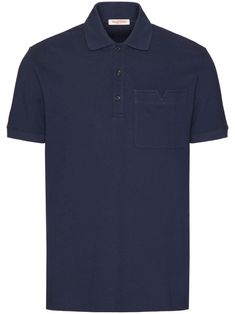 Valentino Ready To Wear navy blue cotton polo collar front button placket short sleeves chest patch pocket The full look includes Valentino Garavani accessories. Blue Casual Polo Shirt With Pockets, Casual Blue Polo Shirt With Pockets, Classic Blue Polo Shirt With Pockets, Navy Polo Collar Top With Pockets, Blue Polo Shirt With Collar And Placket, Navy Polo Shirt With Button Closure For Work, Blue Polo Shirt With Collar Placket, Blue Polo Shirt With Collar, Collared Polo Shirt With Pockets