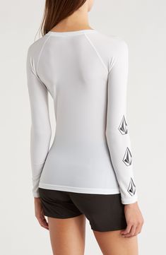 Long sleeves extend your comfort in the sun in this rashguard made from a quick-drying fabric with plenty of stretch to keep you moving. 24 1/2" length (size Medium) Crewneck Long sleeves UPF 50+ sun protection 86% polyester, 14% elastane Hand wash, line dry Imported Stretch Crew Neck Rash Guard With Upf 50+, Stretch Rash Guard With Upf 50+ And Crew Neck, White Rash Guard With Upf 50+ For Surfing, White Surfing Tops With Upf 50+, Fitted Surfing Tops With Upf 50+, White Fitted Rash Guard For Beach, White Upf 50+ Surfing Top, Casual White Rash Guard For Swimming, Crew Neck Moisture-wicking Rash Guard For Swimming