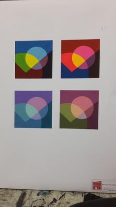 four squares with different colors and shapes on them