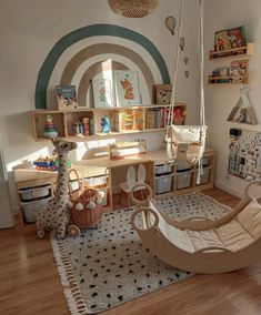 a child's room with a swing chair, bookshelf and toys