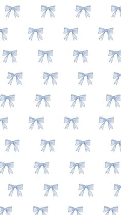 blue bows on a white background are featured in this seamless wallpaper pattern that is perfect for any type of design