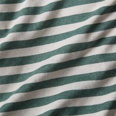 a green and white striped shirting material with horizontal stripes on it's side