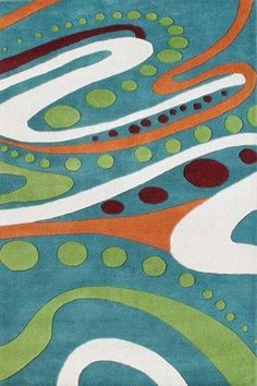 a green rug with an abstract design on it