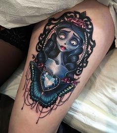 a woman's leg with a tattoo on it that has an image of snow white