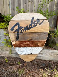 a wooden sign that says fenderer on it