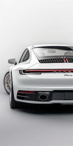 the rear end of a white sports car