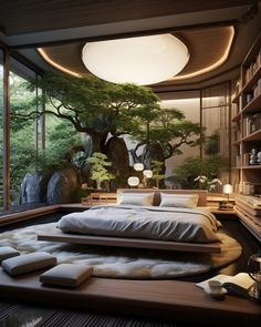 a large bed sitting under a tree in a bedroom