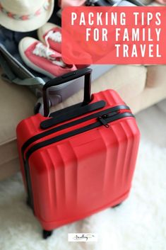 a red suitcase with the words packing tips for family travel