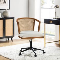 an office chair sitting on top of a white rug