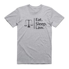 "Eat Sleep Law T-Shirt Lawyer T-shirt Tumbler Shirt Instagram Tee Gift t shirt Lawyer T-shirt Law Student Shirt I'm a Lawyer T-shirt Fabric: 100% cotton, Unisex t-shirt Product Specifications - Please, check the image for a size chart, it shows the measurements of t-shirt from armpit to armpit and t-shirt length. BODY LENGTH: Lay garment flat (face down). Measure from center back neckline seam straight down to bottom of the front hem.BODY WIDTH: Lay garment flat. 1\" below the armhole flat measu Tri-blend Graphic Tee Shirt With Letter Print, Funny Text Crew Neck T-shirt In Ring-spun Cotton, Law Club Shirts, Gray Graphic Tee With Funny Text, Graphic Tee Tri-blend Pre-shrunk T-shirt, Funny Tri-blend T-shirt With Screen Print, Funny Text Tri-blend T-shirt, Lawyer Tshirt Design, Necklace For Lawyer