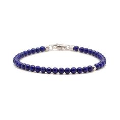 Handcrafted with rich blue Lapis Lazuli and accented with a single sterling silver bead, this piece is an easy and timeless addition to any man's jewelry collection. Sterling Silver Lapiz Lazuli 4mm Thickness Lobster Clasp Handcrafted in LA Lapis Lazuli: Wisdom, Protection, Intellectual Clarity, Emotional Healing Determining your bracelet size: Encircle your wrist with a flexible tape measure and record the measurement. Add 1/2 to 1 inch to your wrist measurement for a comfortable bracelet fit. Blue Beaded Bracelets With Sterling Silver Clasp, Classic Blue Sterling Silver Bracelets, Everyday Blue Jewelry With 8mm Beads, Classic Blue Round Beads Jewelry, Classic Blue Round Bead Jewelry, Pearl Jewelry Gift, Blue Lapis Lazuli, Stacked Jewelry, Blue Lapis