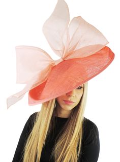 Hats By Cressida Kentucky Derby Ascot Fascinator Hats Coral Barn Owl Fascinator Hat Gorgeous extra large dark coral sinamay flat saucer hatinator trimmed with a coral modern take on a bow This coral fascinator measures 48cm wide or about 19 inches This headpiece is mounted with a matching headband.   If you prefer a headband to match your hair, please make a note at check out what colour headband you want. Our Barn Owl Saucer Fascinator Hatinator that's perfect for any formal occasion, wedding, High Crown Fascinator For Royal Ascot, Brimmed Headpiece For Royal Ascot, Orange Evening Hats For Spring, Elegant Orange Summer Costume Hat, Spring Evening Orange Hat, Curved Brim Headpiece For Royal Ascot, Spring Races Sinamay Top Hat, Summer Party Top Hat Made Of Sinamay, Orange Hats For Spring Races