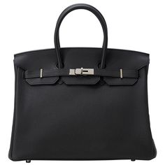 Hermès Birkin 35 in noir and togo leather with palladium hardware. The bag is in a good condition, the hardware and the lock have scratches and discoloration. Comes as full set including the original receipt. Stamp A (2017) Formal Togo Leather Bag With Lock, Office Togo Leather Bag With Lock, Togo Leather Bags With Metal Hardware For Everyday Use, Everyday Togo Leather Bag With Metal Hardware, Timeless Togo Leather Office Bag, Elegant Togo Leather Bags With Metal Hardware, Classic Togo Leather Bag With Silver-tone Hardware, Togo Leather Travel Bag With Metal Hardware, Travel Bag With Togo Leather And Metal Hardware