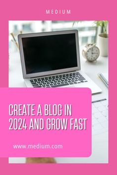 a laptop computer sitting on top of a desk next to a pink sign that says create a blog in 2012 and grow fast