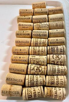 a bunch of wine corks stacked on top of each other