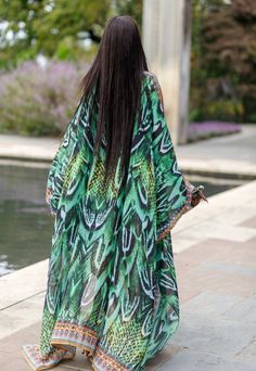 Brazil Goddess Kaftan – saisankoh Green V-neck Kaftan With Vibrant Print, Green V-neck Beach Dress For Vacation, Tropical Green Kaftan For Beach Cover-up, Green Cover-up For Beach Party Vacation, Green Vibrant Print Dress For Beach Season, Green Long Printed Kaftan, Green V-neck Kaftan For Vacation, Green Bohemian Kaftan With Floral Print, Green V-neck Kimono For Vacation