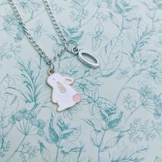 Free gifts If you purchase 2 or more items ( add on's not included) you will get a free scrunchie & stickers :) Bunny necklace, Easter bunny gifts, rabbit necklace, rabbit jewellery, rabbit lover gifts, white rabbit, cute gifts, animal lover gifts, Add on birthstone https://www.etsy.com/uk/listing/691586391/add-on-a-birthstone-charm-to-any-piece Why not have a go at the LUCKY DIP https://www.etsy.com/listing/1095282417/charm-necklace-jewellery-lucky-dip-charm Add on a PERSONALISED GIFT BOX  http Easter Necklace, Rabbit Necklace, Rabbit Jewelry, Personalised Gift Box, Silver Initial Charms, Easter Bunny Gifts, Bunny Necklace, Pride Jewellery, Rabbit Charm