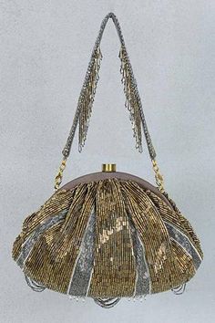 Antique gold and silver soft frame pochette, hand embroidered with luminous Japanese micro beads and baroque pearls, scallop tassels and baroque fringes with chain handle. - Aza Fashions Hand Embellished Potli Pouch Bag For Evening, Glamorous Hand Embellished Festive Bags, Glamorous Festive Hand Embellished Bags, Silver Hand-embellished Bag For Events, Hand Embellished Silver Bag For Formal Occasions, Formal Hand-embellished Silver Bag, Formal Hand Embellished Silver Bag, Formal Silver Hand-embellished Bag, Elegant Silver Potli Bag For Evening