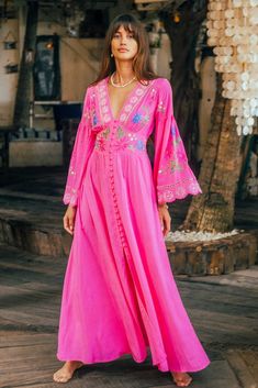 Cartagena Gown in bright magenta color is a romantic masterpiece on its own. So much detail has gone into creating this stunning design including an elegant empire waist and fabric covered button up silhouette, elasticated back to fit well all body shapes and embroidered cool bell sleeves. This gorgeous button-up can be worn also open as a layering piece adding an incredible depth to any outfit. Pair this beauty with tan slides and fine jewelry for an afternoon soiree with friends.100% Rayon SIZ Jeans Long Skirt, Hemant And Nandita, Long Linen Dress, Magenta Color, Panel Dress, Fabric Covered Button, Kimono Dress, Linen Dresses, A Romantic