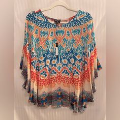 Nwt! Nicky Hilton X Tolani Blouse. Size M. Originally $193. Designer Top At It’s Best! Super Diverse! Can Wear With Denim Or White Jeans Or A Dressy Skirt! Can Dress Up Or Down! Flowy & Super Comfortable! Fall Vacation Tops With Bell Sleeves, Bell Sleeve Tops For Fall Vacation, Fall Vacation Bell Sleeve Tops, Multicolor Rayon Blouse For Spring, Vacation Rayon Blouse With Print, Flowy Vibrant Print Blouse, Vacation Printed Rayon Blouse, Flowy Printed Top For Brunch, Flowy Bell Sleeve Tops For Vacation