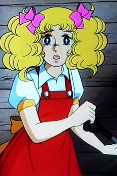 the blonde haired girl is wearing an apron