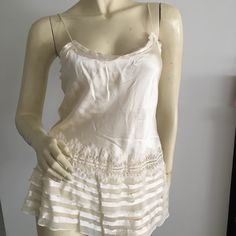 Poleci Silk Camisole Tank Top With Adjustable Straps And Lace Detail. Size 6. This Is New Without Tags, But Is Not Used! Excellent Condition. Color Is Cream. Made In Usa. Retailed For Over $200 Feminine White Silk Camisole, White Silk Camisole For Summer, White Silk Spaghetti Strap Camisole, Elegant White Tank Top With Delicate Straps, White Silk Summer Camisole, Silk Strappy Top For Summer, Summer Silk Tops With Delicate Straps, White Silk Camisole For Spring, Silk Tops With Delicate Straps For Summer