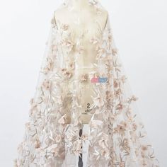 a mannequin is covered in plastic with flowers