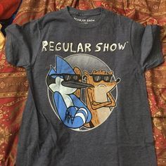 a t - shirt that says regular show on it