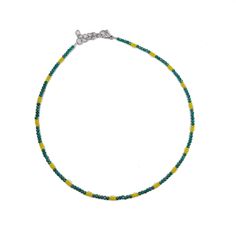 Beautiful shiny choker necklace with green and yellow crystal beads. This beautiful necklace made from 1mm green and yellow crystal beads, and closes with a stainless steel clasp and a stainless steel adjustable chain (2inches). SIZE This necklace is available in 2 different sizes: (14inch-16inch) - (6inch-18inch). Please contact with me if you prefer a different size. Every item we sell is handmade and handcrafted with love and care. All PolysJewelryArt jewelry arrived in a beautiful box or pouch ready for giving. We advise you to try to keep the jewelry away from water, chemicals and perfumes to keep it in perfect contition. Feel free to contact me for any questions or requests. Cancellations - We accept cancellations within 12 hours of purchase. Contact with me for any question. Adjustable Yellow Choker With Tiny Beads, Green Beaded Choker Jewelry, Green Choker With Tiny Round Beads, Green Tiny Beads Choker Necklace, Adjustable Green Choker With Tiny Beads, Green Tiny Beads Choker, Green Beaded Choker, Black Anklet, Minimal Choker