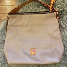 Dooney And Bourke Large Taupe Leather Bag. Interior And Exterior Like New Condition, No Signs Of Wear. Zipper Closure. Measures Approximately 16” Wide And 15” Long. Dooney & Bourke Bag, Bag Interior, Taupe Leather, Hobo Purse, Colorful Bags, Dooney And Bourke, Leather Hobo Bag, Dooney & Bourke Bags, Dooney & Bourke