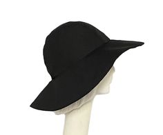 Unleash your inner adventurer with our Black Sun Hat! Made from soft twill cotton, it boasts a padded band and lining for maximum comfort. Whether traveling or simply enjoying the outdoors, this packable and machine washable hat maintains its shape, ensuring style and protection wherever your journey takes you. Handmade in the USA, this hat is ready to take on any challenge with you! 4" wide brim Cotton twill / lined in rayon print / 1" soft cotton band One size fits most up to 23" Machine wash Lightweight Black Hat With Upf 50+, Packable Solid Hat With Short Brim, Lightweight Solid Color Hat With Curved Brim, Lightweight Solid Hat With Curved Brim, Lightweight Hat With Curved Brim, Lightweight Brimmed Hat, Lightweight Wide Brim Black Hat, Lightweight Packable Bucket Hat With Curved Brim, Lightweight Black Wide Brim Hat