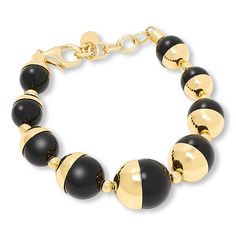 Bellezza Bronze Black Chalcedony Beaded Bracelet Dynamic vintage jewelry inspires this bracelet's metal-meets-stone design. You'll love that a classic color combo and a tapered design make the piece fab for giving outfits a tasteful dash of drama.       Approx. 7"L x 1/2"W with 1" extender      Bronze; goldtone; polished finish      Chain-link extender: lobster-claw clasp     Each bead is black chalcedony, half of which is covered with bronze overlay     Hand-assembled   Stone Information Elegant Gold Bracelets With Large Beads, Modern Black Beaded Bracelet, Modern Polished Beads Bracelet, Elegant Metal Bracelets With Round Beads, Elegant Large Beads Bracelet Jewelry, Elegant Bracelet With Large Beads, Elegant Gold Bracelets With Black Beads, Elegant Large Beaded Bracelet, Formal Spacer Beads Bracelet