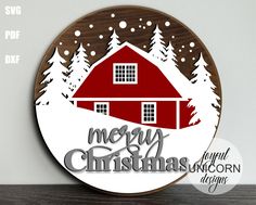 a wooden sign with the words merry christmas on it and a barn in the background