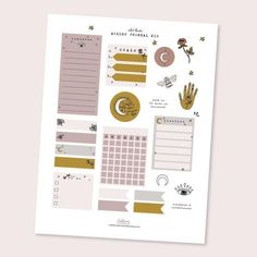 a planner sticker sheet with gold foil and handwritten notes on it, surrounded by other items