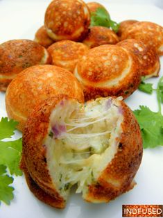 some food on a white plate with parsley sprinkled around the top and sides