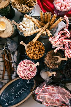 a table topped with lots of candy and candies