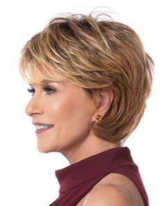 Toni Brattin Wigs Fiber: Heat-Resistant Synthetic Hair Cap Size: Average Hair Length:Front 3.5" | Crown 5" | Sides 2.5" | Back 4" | Nape 3.5" The Toni Brattin Marvelous Wig features a mid-length cut with subtle layering, lots of body, and easy styling. A great sporty yet chic, anytime look-the bangs can be worn full or Wig Outlet, Ponytail Hair Piece, Best Wig Outlet, Monofilament Wigs, Short Hair Haircuts, Short Hair With Layers, Synthetic Wig, Clip In Hair Extensions, Ponytail Hairstyles