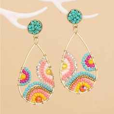 These Beautiful Woven Earrings Will Bring A Special Touch To Your Look! Nicely Made And Lightweight. High Quality!! Posts On The Earrings, Yet They Dangle! (Please Note That The Pink On The Earrings Is A Little Brighter Pink On The Bottom And Right Parts) Sku:E35 Beach Teardrop Beaded Earrings, Beaded Teardrop Earrings For The Beach, Summer Beaded Teardrop Earrings, Colorful Beaded Teardrop Earrings For Beach, Beaded Teardrop Earrings For Summer, Teardrop Earrings With Colorful Beads For Beach, Teardrop Beach Earrings With Colorful Beads, Teardrop Beach Jewelry With Colorful Beads, Bohemian Beaded Teardrop Earrings For Party