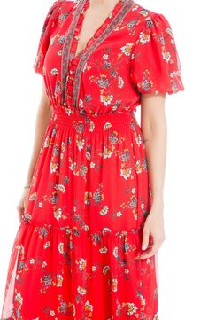 A smocked waist defines the silhouette of a maxi dress finished in a bold pattern for eye-catching appeal. 52 3/4" length Surplice V-neck Short sleeves Lined 100% polyester Machine wash, line dry Imported Red Smock Midi Dress, Red Smocked Dresses, Red Smocked Dress For Spring Vacation, Red Smocked Dress For Vacation In Spring, Red Fitted Maxi Dress With Smocked Back, Spring Vacation Red Smocked Dress, Red Smocked Bodice Maxi Dress For Summer, Red Maxi Dress With Smocked Bodice For Summer, Red Smocked Dress With Smocked Back For Vacation