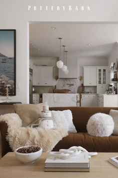 a living room filled with furniture and a bowl of food on top of a table