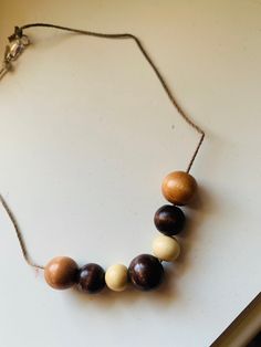 Wooden beads on cotton necklace :) Casual Natural Jewelry With Wooden Beads, Casual Brown Beaded Necklaces With Colorful Beads, Casual Wooden Beads Necklace As Gift, Casual Wooden Beads Necklace For Gift, Everyday Bohemian Necklace With Round Beads, Casual Brown Beaded Necklaces, Bohemian Necklaces With Large Beads For Everyday, Casual Wooden Beaded Necklaces For Jewelry Making, Casual Wooden Beads Necklace For Jewelry Making