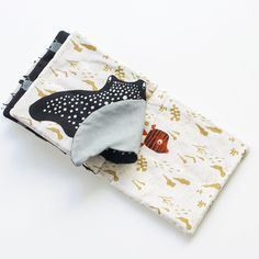 a small pouch with a fish on it